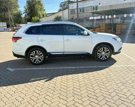 Белый Мицубиси Аутлендер, объемом двигателя 3 л и пробегом 79 тыс. км за 18500 $, фото 2 на Automoto.ua