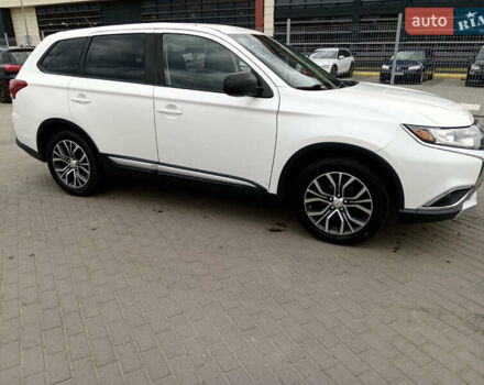 Белый Мицубиси Аутлендер, объемом двигателя 2.4 л и пробегом 225 тыс. км за 10999 $, фото 2 на Automoto.ua