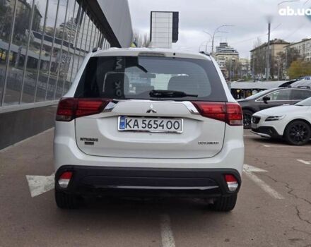 Белый Мицубиси Аутлендер, объемом двигателя 2.4 л и пробегом 115 тыс. км за 19300 $, фото 5 на Automoto.ua