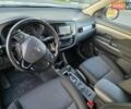 Белый Мицубиси Аутлендер, объемом двигателя 2.36 л и пробегом 230 тыс. км за 15900 $, фото 8 на Automoto.ua