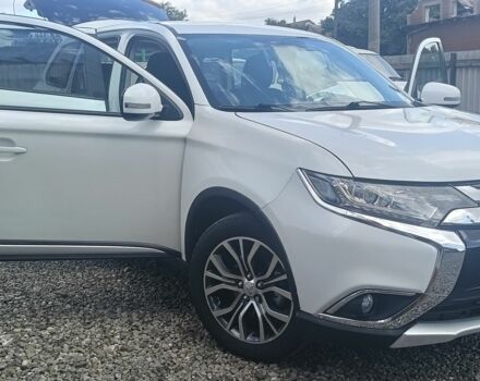 Белый Мицубиси Аутлендер, объемом двигателя 2.4 л и пробегом 117 тыс. км за 16500 $, фото 1 на Automoto.ua