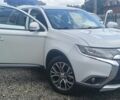 Белый Мицубиси Аутлендер, объемом двигателя 2.4 л и пробегом 117 тыс. км за 16500 $, фото 1 на Automoto.ua