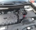Белый Мицубиси Аутлендер, объемом двигателя 2.36 л и пробегом 90 тыс. км за 15500 $, фото 1 на Automoto.ua