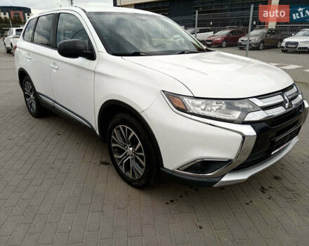 Белый Мицубиси Аутлендер, объемом двигателя 2.4 л и пробегом 225 тыс. км за 10999 $, фото 3 на Automoto.ua