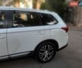 Белый Мицубиси Аутлендер, объемом двигателя 2.36 л и пробегом 90 тыс. км за 15500 $, фото 2 на Automoto.ua