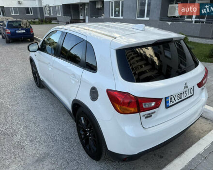 Белый Мицубиси Аутлендер, объемом двигателя 2 л и пробегом 133 тыс. км за 13000 $, фото 12 на Automoto.ua