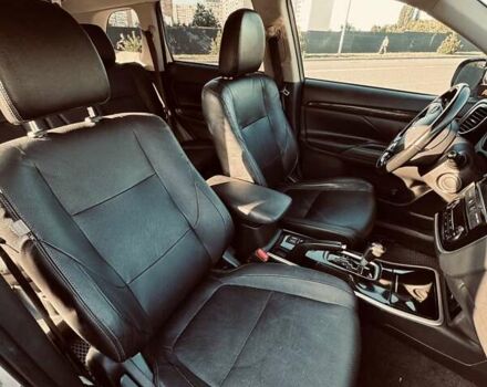 Белый Мицубиси Аутлендер, объемом двигателя 2.36 л и пробегом 149 тыс. км за 15800 $, фото 7 на Automoto.ua