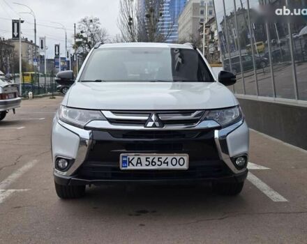 Белый Мицубиси Аутлендер, объемом двигателя 2.4 л и пробегом 115 тыс. км за 19300 $, фото 2 на Automoto.ua