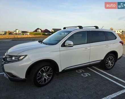 Белый Мицубиси Аутлендер, объемом двигателя 2.36 л и пробегом 230 тыс. км за 15900 $, фото 4 на Automoto.ua