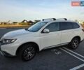 Белый Мицубиси Аутлендер, объемом двигателя 2.36 л и пробегом 230 тыс. км за 15900 $, фото 4 на Automoto.ua