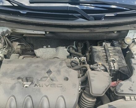 Белый Мицубиси Аутлендер, объемом двигателя 2.4 л и пробегом 117 тыс. км за 16500 $, фото 7 на Automoto.ua