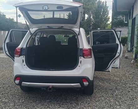 Белый Мицубиси Аутлендер, объемом двигателя 2.4 л и пробегом 117 тыс. км за 16500 $, фото 2 на Automoto.ua