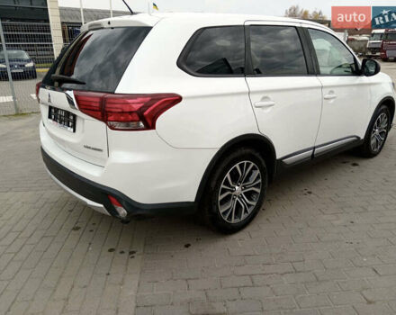 Белый Мицубиси Аутлендер, объемом двигателя 2.4 л и пробегом 225 тыс. км за 10999 $, фото 1 на Automoto.ua