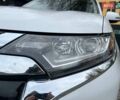Белый Мицубиси Аутлендер, объемом двигателя 2.36 л и пробегом 153 тыс. км за 15700 $, фото 2 на Automoto.ua