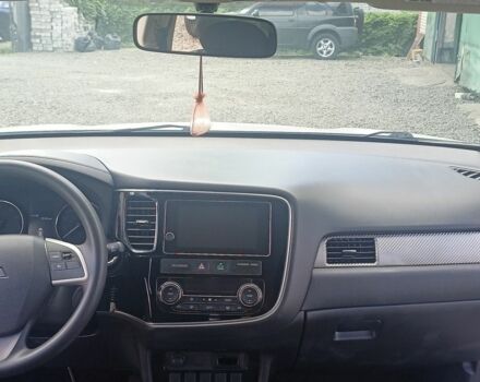 Белый Мицубиси Аутлендер, объемом двигателя 2.4 л и пробегом 117 тыс. км за 16500 $, фото 3 на Automoto.ua