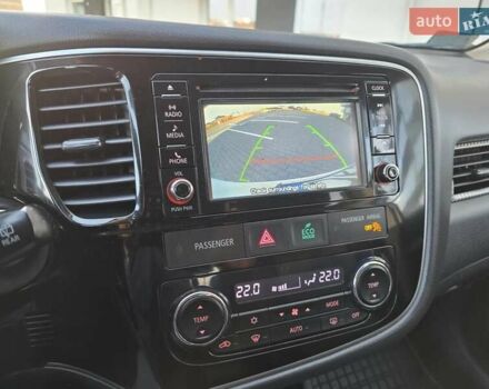 Белый Мицубиси Аутлендер, объемом двигателя 2.36 л и пробегом 230 тыс. км за 15900 $, фото 12 на Automoto.ua