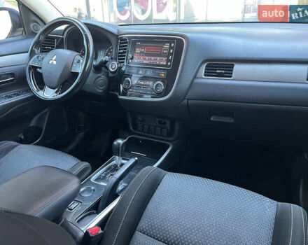 Белый Мицубиси Аутлендер, объемом двигателя 2.4 л и пробегом 210 тыс. км за 13550 $, фото 7 на Automoto.ua