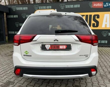 Белый Мицубиси Аутлендер, объемом двигателя 2.36 л и пробегом 153 тыс. км за 15700 $, фото 8 на Automoto.ua