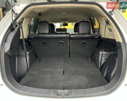 Белый Мицубиси Аутлендер, объемом двигателя 2.36 л и пробегом 153 тыс. км за 15700 $, фото 10 на Automoto.ua