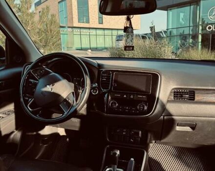 Белый Мицубиси Аутлендер, объемом двигателя 2.36 л и пробегом 149 тыс. км за 15800 $, фото 6 на Automoto.ua