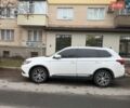 Белый Мицубиси Аутлендер, объемом двигателя 3 л и пробегом 207 тыс. км за 18000 $, фото 1 на Automoto.ua