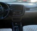 Белый Мицубиси Аутлендер, объемом двигателя 2.36 л и пробегом 90 тыс. км за 15500 $, фото 1 на Automoto.ua