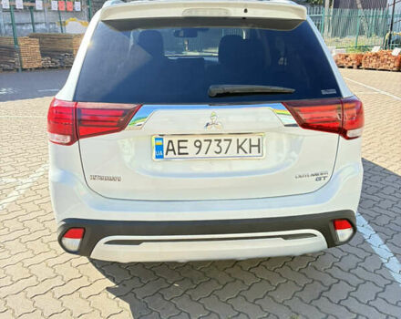 Белый Мицубиси Аутлендер, объемом двигателя 3 л и пробегом 79 тыс. км за 18500 $, фото 3 на Automoto.ua