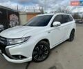 Белый Мицубиси Аутлендер, объемом двигателя 2 л и пробегом 116 тыс. км за 18900 $, фото 1 на Automoto.ua