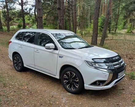 Белый Мицубиси Аутлендер, объемом двигателя 2 л и пробегом 127 тыс. км за 20000 $, фото 8 на Automoto.ua