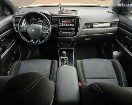 Белый Мицубиси Аутлендер, объемом двигателя 2.4 л и пробегом 115 тыс. км за 19300 $, фото 19 на Automoto.ua