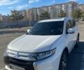 Білий Міцубісі Аутлендер, об'ємом двигуна 2.36 л та пробігом 88 тис. км за 17700 $, фото 1 на Automoto.ua