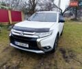 Белый Мицубиси Аутлендер, объемом двигателя 2.36 л и пробегом 168 тыс. км за 15300 $, фото 1 на Automoto.ua