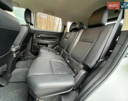 Белый Мицубиси Аутлендер, объемом двигателя 2.36 л и пробегом 153 тыс. км за 15700 $, фото 32 на Automoto.ua