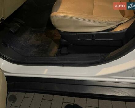 Белый Мицубиси Аутлендер, объемом двигателя 3 л и пробегом 148 тыс. км за 18500 $, фото 18 на Automoto.ua