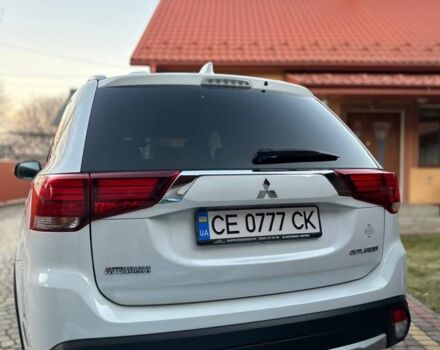 Білий Міцубісі Аутлендер, об'ємом двигуна 2 л та пробігом 161 тис. км за 18000 $, фото 2 на Automoto.ua