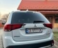 Білий Міцубісі Аутлендер, об'ємом двигуна 2 л та пробігом 161 тис. км за 18000 $, фото 2 на Automoto.ua