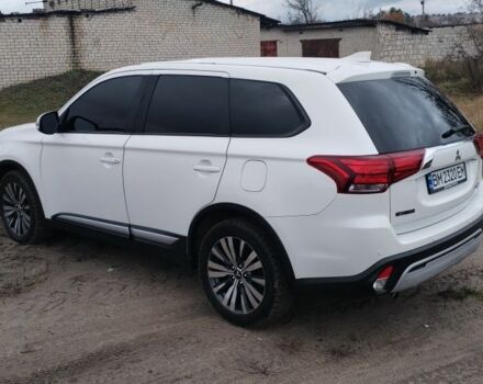 Белый Мицубиси Аутлендер, объемом двигателя 2.4 л и пробегом 122 тыс. км за 17400 $, фото 6 на Automoto.ua