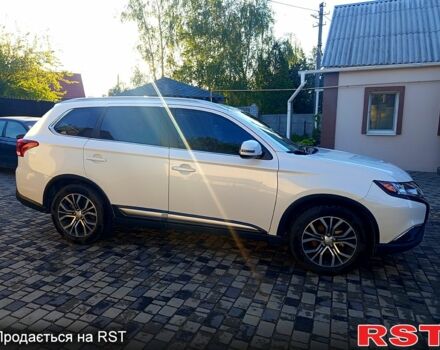 Белый Мицубиси Аутлендер, объемом двигателя 2.4 л и пробегом 87 тыс. км за 16800 $, фото 5 на Automoto.ua