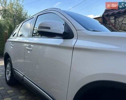 Белый Мицубиси Аутлендер, объемом двигателя 2 л и пробегом 56 тыс. км за 19400 $, фото 14 на Automoto.ua