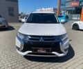 Белый Мицубиси Аутлендер, объемом двигателя 2 л и пробегом 225 тыс. км за 18500 $, фото 1 на Automoto.ua