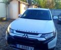 Белый Мицубиси Аутлендер, объемом двигателя 2.4 л и пробегом 87 тыс. км за 16800 $, фото 1 на Automoto.ua