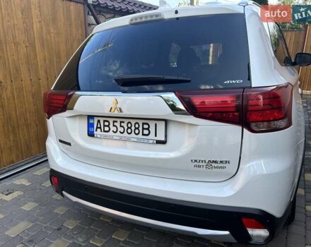 Белый Мицубиси Аутлендер, объемом двигателя 2 л и пробегом 56 тыс. км за 19400 $, фото 5 на Automoto.ua