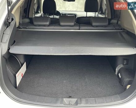 Белый Мицубиси Аутлендер, объемом двигателя 2.36 л и пробегом 112 тыс. км за 21500 $, фото 11 на Automoto.ua