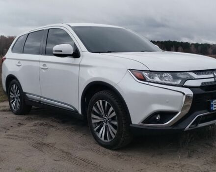 Белый Мицубиси Аутлендер, объемом двигателя 2.4 л и пробегом 122 тыс. км за 17400 $, фото 2 на Automoto.ua