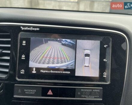 Белый Мицубиси Аутлендер, объемом двигателя 2.36 л и пробегом 112 тыс. км за 21500 $, фото 23 на Automoto.ua