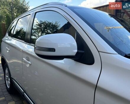 Белый Мицубиси Аутлендер, объемом двигателя 2 л и пробегом 56 тыс. км за 19400 $, фото 77 на Automoto.ua