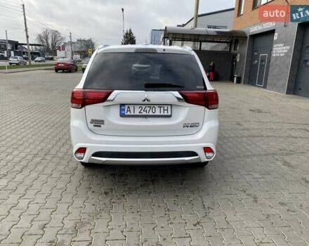 Білий Міцубісі Аутлендер, об'ємом двигуна 2 л та пробігом 118 тис. км за 17800 $, фото 56 на Automoto.ua