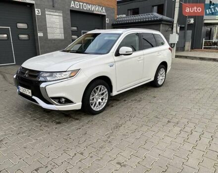 Білий Міцубісі Аутлендер, об'ємом двигуна 2 л та пробігом 118 тис. км за 17800 $, фото 34 на Automoto.ua