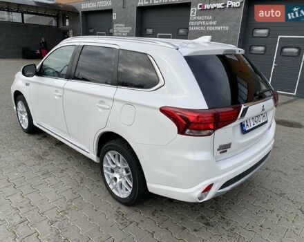 Білий Міцубісі Аутлендер, об'ємом двигуна 2 л та пробігом 118 тис. км за 17800 $, фото 57 на Automoto.ua