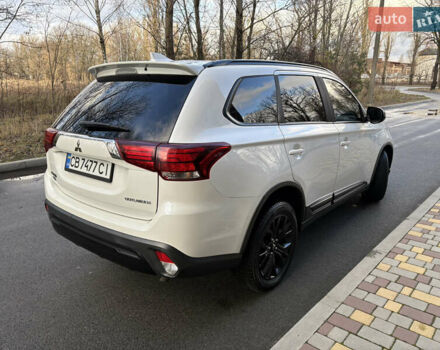 Білий Міцубісі Аутлендер, об'ємом двигуна 2.4 л та пробігом 130 тис. км за 15700 $, фото 3 на Automoto.ua